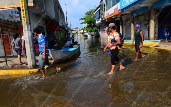 Anuncia AMLO decreto para evitar inundaciones 