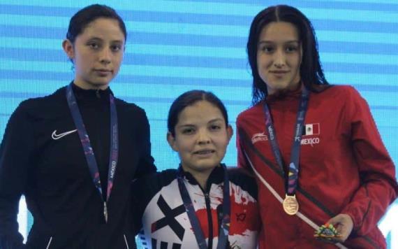 La nadadora comalcalquense, Naomi Somellera logró medalla de oro y plata