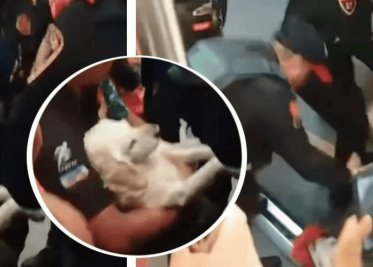 Policías sacan a hombre con perrito herido del Metro CDMX